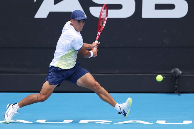 Argentina's Sebastian Baez hits a return against Czech Republic's Jakub Mensik during their men's singles final match at the ATP Auckland Classic tennis tournament in Auckland on January 17, 2026. (Photo by Michael Bradley / AFP)