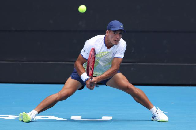 Argentina's Sebastian Baez hits a return against Czech Republic's Jakub Mensik during their men's singles final match at the ATP Auckland Classic tennis tournament in Auckland on January 17, 2026. (Photo by Michael Bradley / AFP)