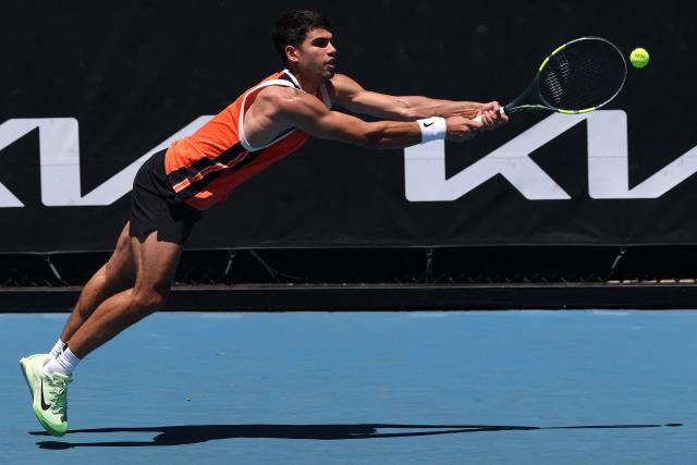 Spain's Carlos Alcaraz attends a practice session ahead of the 2026 Australian Open tennis tournament in Melbourne on January 17, 2026. (Photo by DAVID GRAY / AFP)