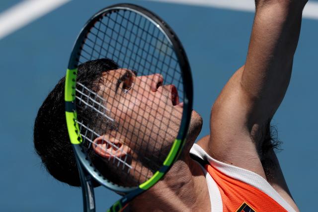 Spain's Carlos Alcaraz attends a practice session ahead of the 2026 Australian Open tennis tournament in Melbourne on January 17, 2026. (Photo by DAVID GRAY / AFP)