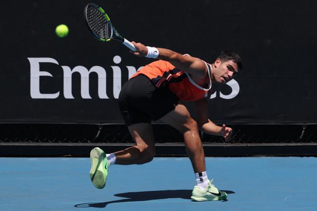 Spain's Carlos Alcaraz attends a practice session ahead of the 2026 Australian Open tennis tournament in Melbourne on January 17, 2026. (Photo by DAVID GRAY / AFP)