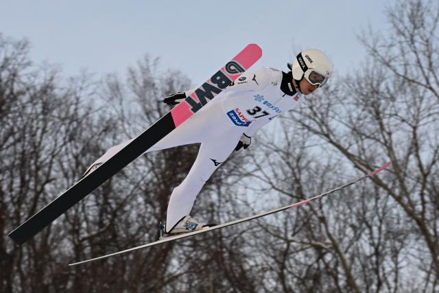 Japan's Naoki Nakamura performs his first jump in the individual large hill HS137 competition on the second day of men's FIS Ski Jumping World Cup competition in Sapporo on January 17, 2026. (Photo by Toshifumi KITAMURA / AFP)