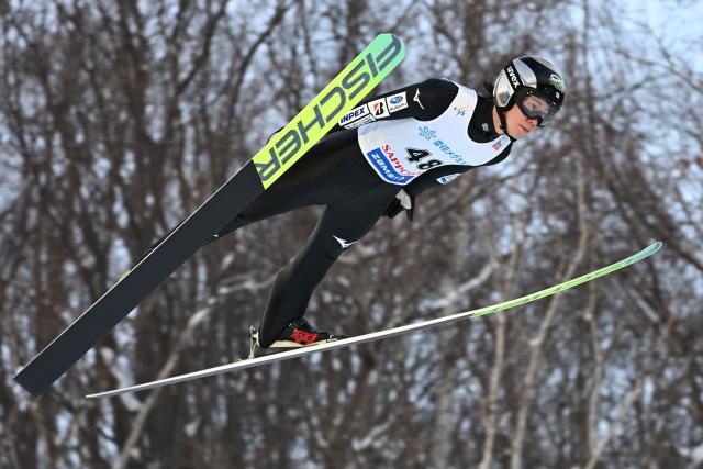 Japan's Ren Nikaido performs his first jump in the individual large hill HS137 competition on the second day of men's FIS Ski Jumping World Cup competition in Sapporo on January 17, 2026. (Photo by Toshifumi KITAMURA / AFP)