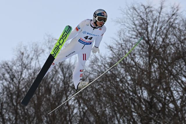Austria's Stephan Embacher performs his first jump in the individual large hill HS137 competition on the second day of men's FIS Ski Jumping World Cup competition in Sapporo on January 17, 2026. (Photo by Toshifumi KITAMURA / AFP)