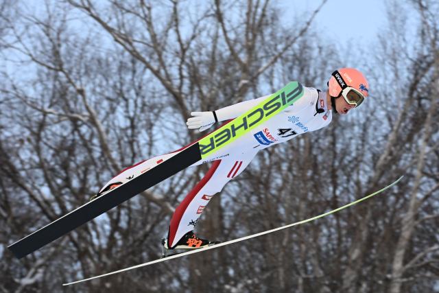 Austria's Jan Hoerl performs his first jump in the individual large hill HS137 competition on the second day of men's FIS Ski Jumping World Cup competition in Sapporo on January 17, 2026. (Photo by Toshifumi KITAMURA / AFP)
