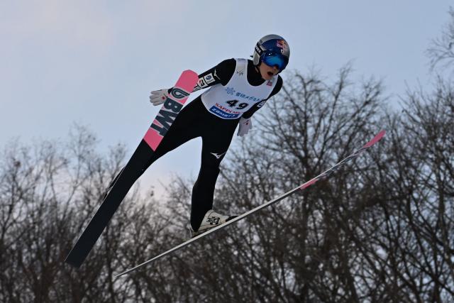 Japan's Ryoyu Kobayashi performs his first jump in the individual large hill HS137 competition on the second day of men's FIS Ski Jumping World Cup competition in Sapporo on January 17, 2026. (Photo by Toshifumi KITAMURA / AFP)