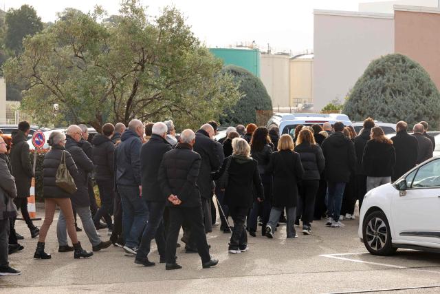 Family members and relatives follow the hearse during the funeral of former Corsican nationalist Alain Orsoni in Ajaccio, on the French Mediterranean Island of Corsica on January 17, 2026. Former Corsican nationalist leader turned businessman and former head of the AC Ajaccio football club, Alain Orsoni, 71, was shot dead on January 12, 2026 while attending his mother's funeral in the small Corsican village of Vero, triggering a new wave of shock across the Island of Corsica, which has been ravaged by internecine conflicts between criminal gangs. (Photo by Pascal POCHARD-CASABIANCA / AFP)