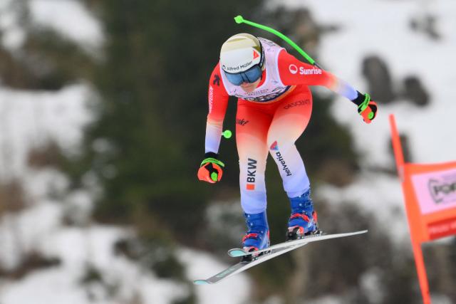 Switzerland's Priska Nufer competes during the Women's Downhill event of FIS Alpine Skiing World Cup in Tarvisio, Italy on January 17, 2026. (Photo by Marco BERTORELLO / AFP)