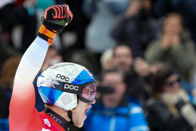 Switzerland's Marco Odermatt reacts in the finish area of the men's Alpine downhill race of the FIS Alpine Skiing World Cup in Wengen, on January 17, 2026. (Photo by Dimitar DILKOFF / AFP)