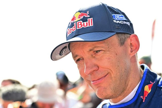 Third placed Ford Racing’s Swedish driver Mattias Ekstrom watches at the end of the 48th edition of the Dakar Rally 2026 in Yanbu, Saudi Arabia, on January 17, 2026. (Photo by Giuseppe CACACE / AFP)