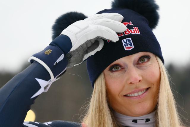 TOPSHOT - US' Lindsey Vonn, third, poses after the podium ceremony of the Women's Downhill event of FIS Alpine Skiing World Cup in Tarvisio, Italy on January 17, 2026. Italy's Nicol Delago won the race ahead of Germany's Kira Weidle, second, and US' Lindsey Vonn, third. (Photo by Marco BERTORELLO / AFP)