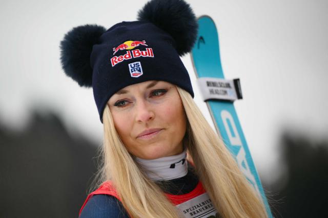 US' Lindsey Vonn, third, poses after the podium ceremony of the Women's Downhill event of FIS Alpine Skiing World Cup in Tarvisio, Italy on January 17, 2026. Italy's Nicol Delago won the race ahead of Germany's Kira Weidle, second, and US' Lindsey Vonn, third. (Photo by Marco BERTORELLO / AFP)