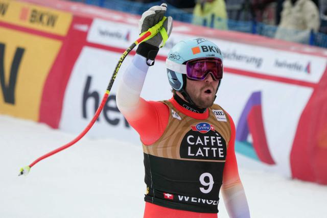 Switzerland's Alexis Monney reacts in the finish area of the men's Alpine downhill race of the FIS Alpine Skiing World Cup in Wengen, on January 17, 2026. (Photo by Dimitar DILKOFF / AFP)