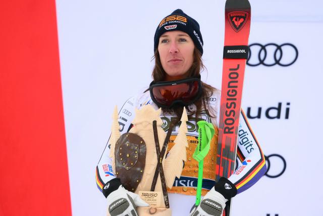 Germany's Kira Weidle, second, stands on the podium of the Women's Downhill event of FIS Alpine Skiing World Cup in Tarvisio, Italy on January 17, 2026. Italy's Nicol Delago won the race ahead of Germany's Kira Weidle, second, and US' Lindsey Vonn, third. (Photo by Marco BERTORELLO / AFP)