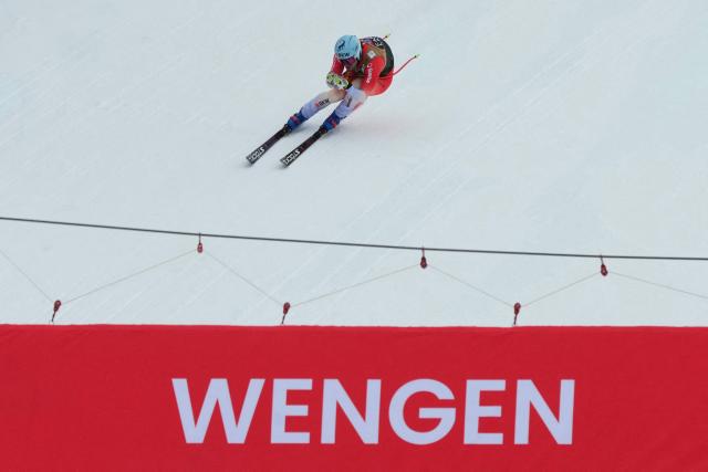 Switzerland's Alexis Monney skies to the finish area of the men's Alpine downhill race of the FIS Alpine Skiing World Cup in Wengen, on January 17, 2026. (Photo by Dimitar DILKOFF / AFP)