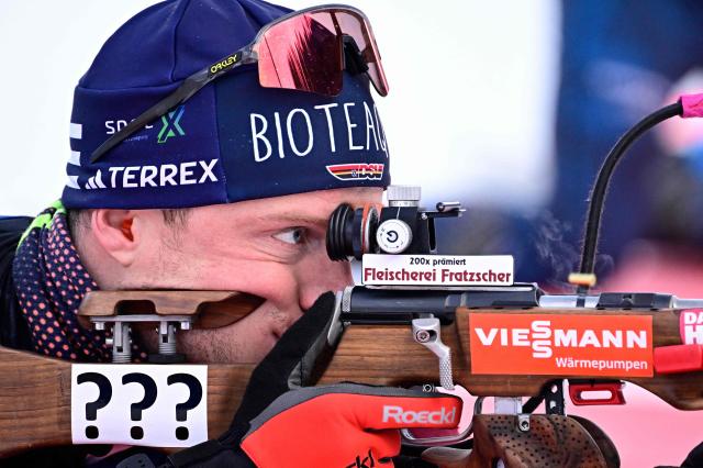 Germany's Lucas Fratzscher zeros his rifle during practise shooting prior to the men's sprint competition of the IBU Biathlon World Cup in Ruhpolding, southern Germany on January 17, 2026. (Photo by Tobias SCHWARZ / AFP)