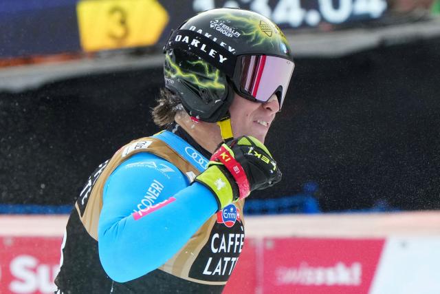 Italy's Giovanni Franzoni reacts in the finish area of the men's Alpine downhill race of the FIS Alpine Skiing World Cup in Wengen, on January 17, 2026. (Photo by Dimitar DILKOFF / AFP)