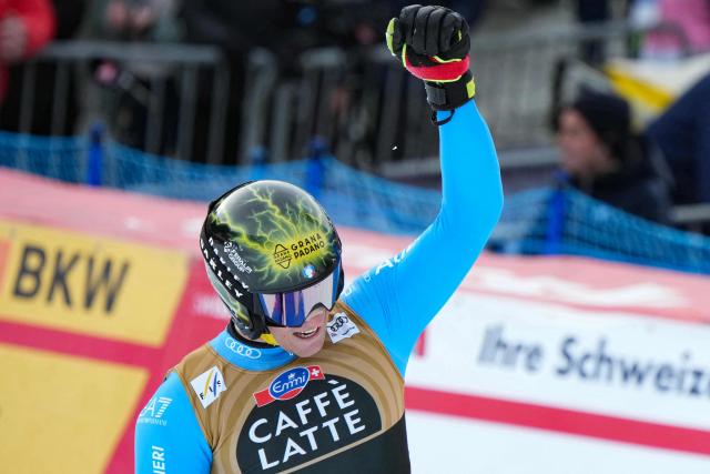 Italy's Giovanni Franzoni reacts in the finish area of the men's Alpine downhill race of the FIS Alpine Skiing World Cup in Wengen, on January 17, 2026. (Photo by Dimitar DILKOFF / AFP)