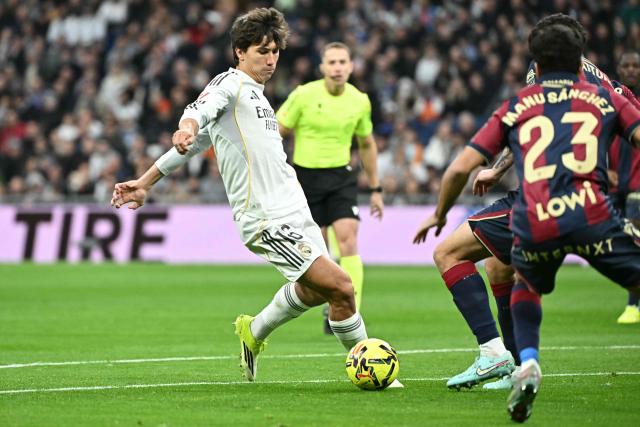 Real Madrid's Spanish forward #16 Gonzalo Garcia kicks the ball during the Spanish league football match between Real Madrid CF and Levante UD at Santiago Bernabeu Stadium in Madrid on January 17, 2026. (Photo by Javier SORIANO / AFP)