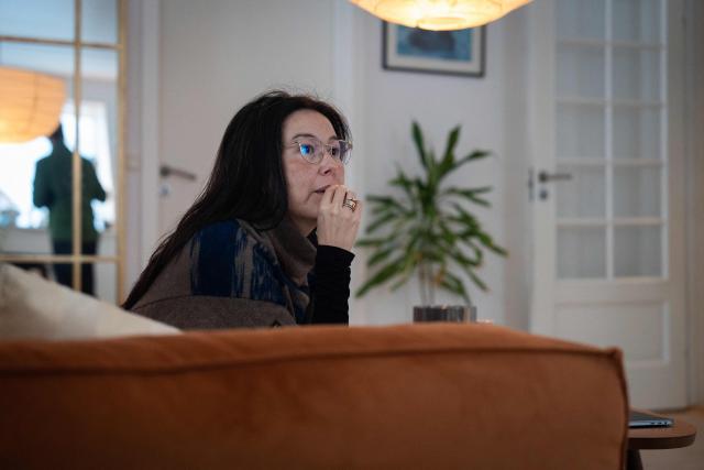 Ulrikke Andersen, a 40-year-old tour operator is pictured at her home in Nuuk, Greenland on January 16, 2026. Ulrikke Andersen says she will plan to leave Greenland in the case of a war or US invasion as US President Donald Trump's designs to take over the Arctic island who no signs of letting up. (Photo by Alessandro RAMPAZZO / AFP)