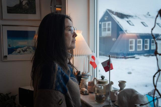 Ulrikke Andersen, a 40-year-old tour operator is pictured at her home in Nuuk, Greenland on January 16, 2026. Ulrikke Andersen says she will plan to leave Greenland in the case of a war or US invasion as US President Donald Trump's designs to take over the Arctic island who no signs of letting up. (Photo by Alessandro RAMPAZZO / AFP)