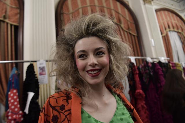 A model gets prepared backstage before designer Rocio Olmedo's show during the XIV edition of the We Love Flamenco fashion show in Seville on January 16, 2026. (Photo by CRISTINA QUICLER / AFP)