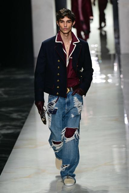 A model walks the runway during the Dolce & Gabbana collection show at Milan's fashion week for Men's Fall/Winter 2026-2027, on January 17, 2026 in Milan. (Photo by Marco BERTORELLO / AFP)