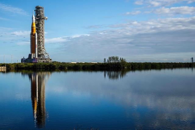 NASA's Artemis II Space Launch System rocket and Orion spacecraft are rolled out of the Vehicle Assembly Building to Launch Pad 39B at Kennedy Space Center in Florida on January 17, 2026, ahead of the crewed lunar mission. (Photo by Jim WATSON / AFP)