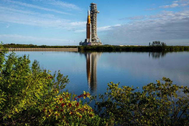 NASA's Artemis II Space Launch System rocket and Orion spacecraft are rolled out of the Vehicle Assembly Building to Launch Pad 39B at Kennedy Space Center in Florida on January 17, 2026, ahead of the crewed lunar mission. (Photo by Jim WATSON / AFP)