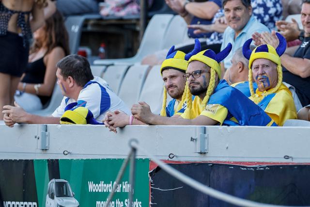 Clermont supporters react during the European Champions Cup rugby union match between Sharks and Clermont in Durban on January 17, 2026. (Photo by PHILL MAGAKOE / AFP)