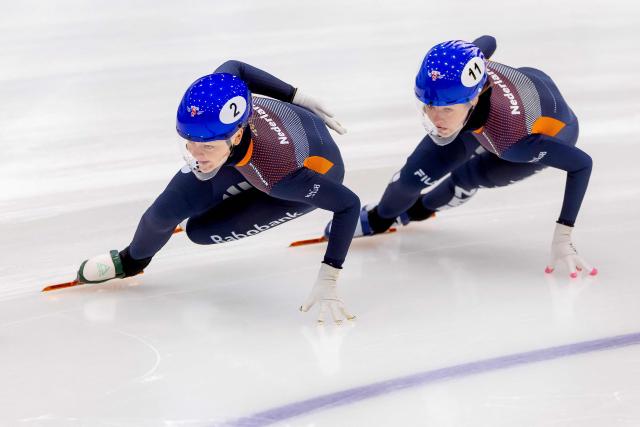 Dutch Xandra Velzeboer and Dutch Michelle Velzeboer competen in the 1000-meter semi-final on the second day of the European Short Track Speed Skating Championships in Tilburg on January 17, 2026. This European Championship is a final test for the short track speed skaters ahead of the Olympic Games in Milan. (Photo by Iris van den Broek / ANP / AFP) / Netherlands OUT
