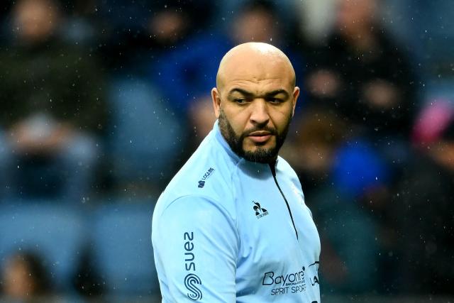 Bayonne's former Moroccan player and new trainer Abdellatif Boutaty looks on prior to the European Champions Cup pool 3, round 4, rugby union match between Aviron Bayonnais (Bayonne) and Leinster Rugby at the Jean Dauger Stadium in Bayonne, southwestern France, on January 17, 2026. (Photo by GAIZKA IROZ / AFP)