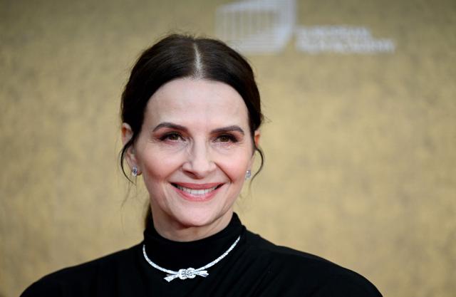 French actress and President of the European Film Academy Juliette Binoche arrives for the European Film Awards on January 17, 2026 in Berlin. (Photo by RALF HIRSCHBERGER / AFP)