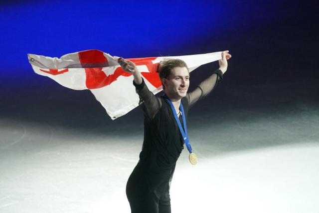 Georgia's Nika Egadze celebrates with his gold medal after victory in men's figure skating on the final day of the ISU Figure Ice Skating European Championships in Sheffield, northern England on January 17, 2026. (Photo by Ian HODGSON / AFP)