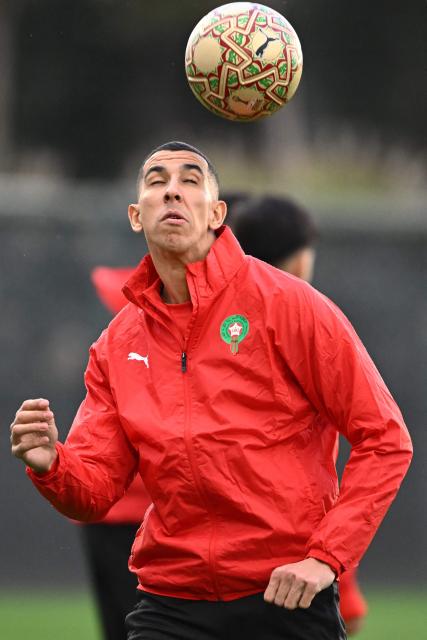 Morocco's defender #18 Jawad El Yamiq takes part in a training session in Rabat on January 17, 2026, on the eve of the Africa Cup of Nations (CAN) final football match between Senegal and Morocco. (Photo by SEBASTIEN BOZON / AFP)