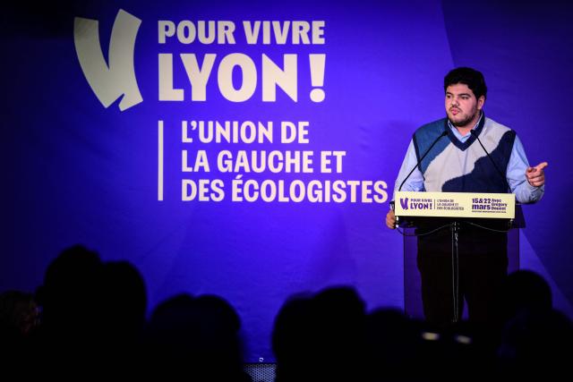 French anti-drug activist Amine Kessaci delivers a speech before the Mayor of Lyon and candidate Gregory Doucet during latter's campaign ahead of the 2026 municipal elections in Lyon, eastern France on January 17, 2026. (Photo by OLIVIER CHASSIGNOLE / AFP)