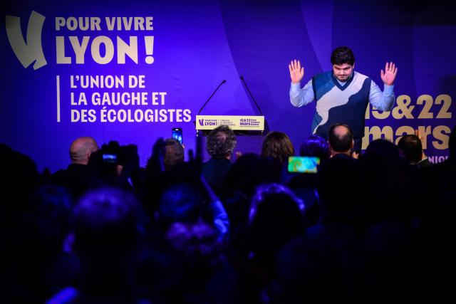French anti-drug activist Amine Kessaci delivers a speech before the Mayor of Lyon and candidate Gregory Doucet during latter's campaign ahead of the 2026 municipal elections in Lyon, eastern France on January 17, 2026. (Photo by OLIVIER CHASSIGNOLE / AFP)