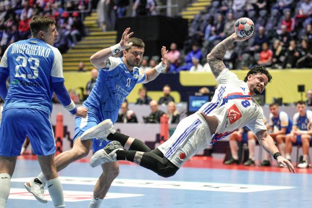 France's left back #08 Elohim Prandi shoots the ball during the EHF Euro 2026 group C preliminary round handball match between Ukraine and France in Baerum near Oslo, Norway, on January 17, 2026. (Photo by Stian Lysberg Solum / NTB / AFP) / Norway OUT