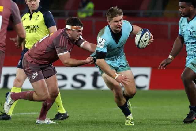 Castres' New Zealand centre Jack Goodhue makes a break during the European Champions Cup pool 2 rugby union match between Munster and Castres Olympique at Thomond Park in Limerick, Ireland on January 17, 2026. (Photo by LORRAINE O'SULLIVAN / AFP)