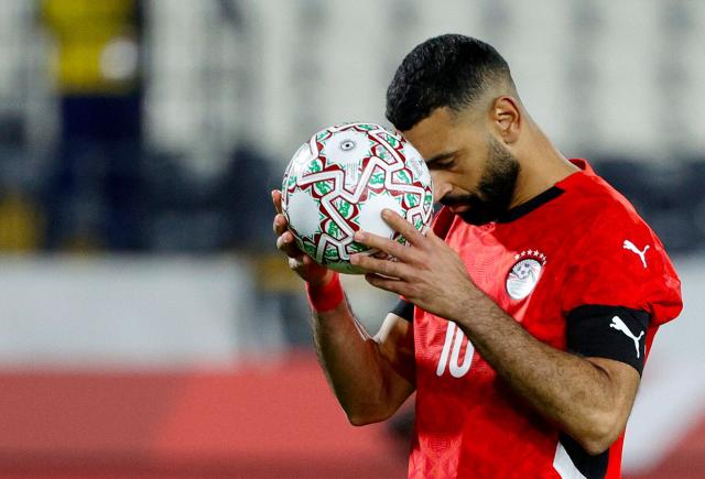 Egypt's forward #10 Mohamed Salah prepares to take a penalty during the Africa Cup of Nations (CAN) third place football match between Egypt and Nigeria at the Mohammed V Stadium in Casablanca on January 17, 2026. (Photo by Abdel Majid BZIOUAT / AFP)