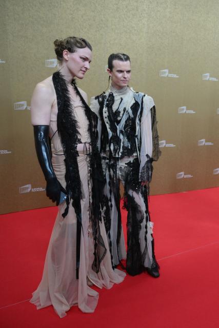 Faun Vium and Danish film director Mathias Broe arrive for the European Film Awards ceremony on January 17, 2026 in Berlin. (Photo by RALF HIRSCHBERGER / AFP)