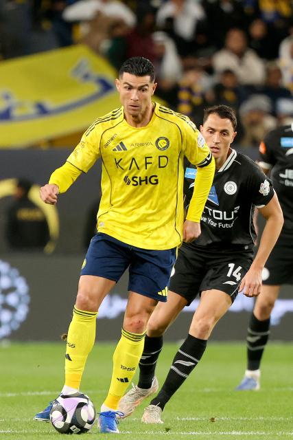 Nassr's Portuguese forward #07 Cristiano Ronaldo runs with the ball during the Saudi Pro League football match between al-Nassr and al-Shabab at al-Awwal Park stadium, in Riyadh on January 17, 2026. (Photo by Fayez Nureldine / AFP)