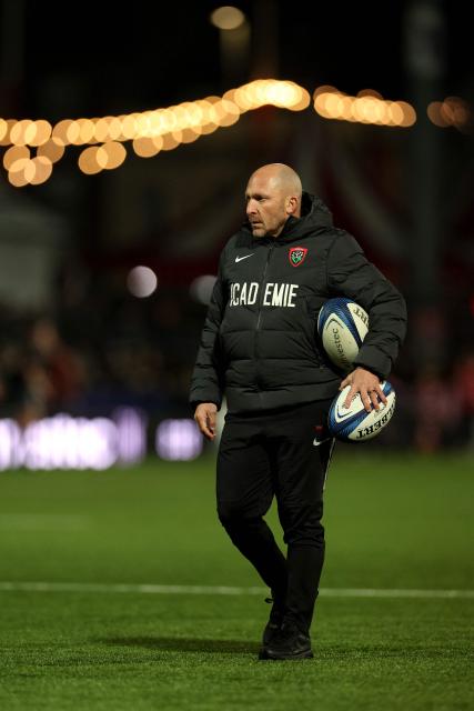 Toulouse's French Head Coach Pierre Mignoni leads a warm up before the European Champions Cup pool 2 rugby union match between Gloucester and Toulon at the Kingsholm Stadium in Gloucester, western England on January 17, 2026. (Photo by Adrian Dennis / AFP)