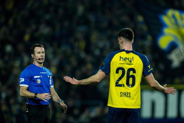 Referee Bram Van Driessche (L) reacts during the Belgian Pro League football match between Royale Union Saint-Gilloise and KV Mechelen at the Joseph-Marien stadium in Brussels on January 17, 2026. (Photo by JASPER JACOBS / Belga / AFP) / Belgium OUT