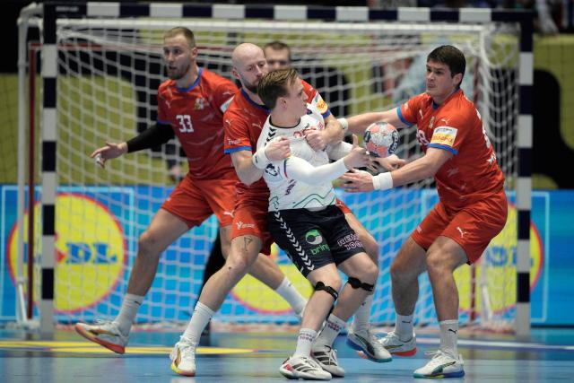 Norway's centre back #22 Tobias Grondahl plays the ball during the EHF Euro 2026 group C preliminary round handball match between Czech Republic and Norway in Baerum near Oslo, Norway, on January 17, 2026. (Photo by Stian Lysberg Solum / NTB / AFP) / Norway OUT