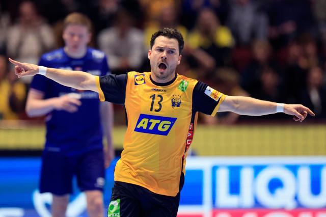 Sweden's right winger #13 Sebastian Karlsson celebrates during the EHF Euro 2026 group E preliminary round handball match between Sweden and The Netherlands in Malmo, Sweden, on January 17, 2026. (Photo by Andreas Hillergren/TT / TT News Agency / AFP) / Sweden OUT