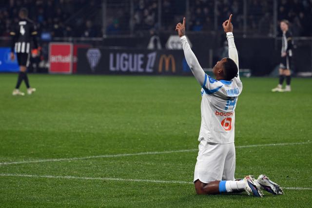 Marseille's Brazilian forward #14 Igor Paixao celebrates after scoring a goal during the French L1 football match between SCO Angers and Olympique de Marseille (OM) at the Stade Raymond-Kopa in Angers, central Framce, on January 17, 2026. (Photo by JEAN-FRANCOIS MONIER / AFP)