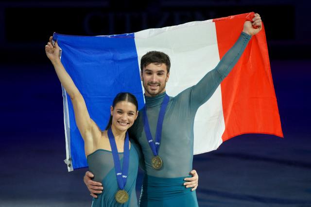 France's Laurence Fournier Beaudry and Guillaume Cizeron pose for a photo after their victory in the Ice Dance Free Dance on the final day of the ISU Figure Ice Skating European Championships in Sheffield, northern England on January 17, 2026. (Photo by Ian HODGSON / AFP)