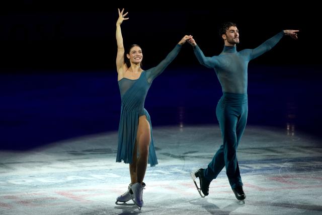 France's Laurence Fournier Beaudry and Guillaume Cizeron pose for a photo after their victory in the Ice Dance Free Dance on the final day of the ISU Figure Ice Skating European Championships in Sheffield, northern England on January 17, 2026. (Photo by Ian HODGSON / AFP)