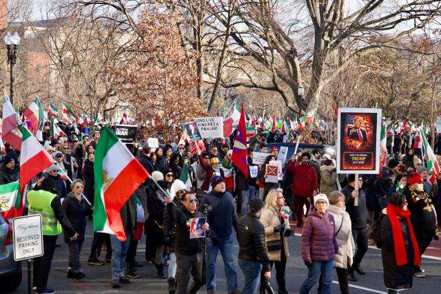 Demonstrators, protesting the deadly crackdown in Iran, rally near the White House in Washington, DC, on January 17, 2026. The United States on January 15 said Iran halted 800 executions of protesters under pressure from President Donald Trump, after Gulf allies appeared to pull him back from military action over Tehran's deadly crackdown on demonstrations. Iran was shaken over the last week by some of the biggest anti-government protests in the history of the Islamic republic, although the demonstrations appear to have diminished over the last few days in the face of repression and a week-long internet blackout. (Photo by Amid FARAHI / AFP)